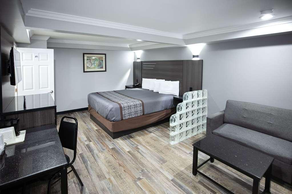 Rodeway Inn & Suites بيلفلاوير الغرفة الصورة